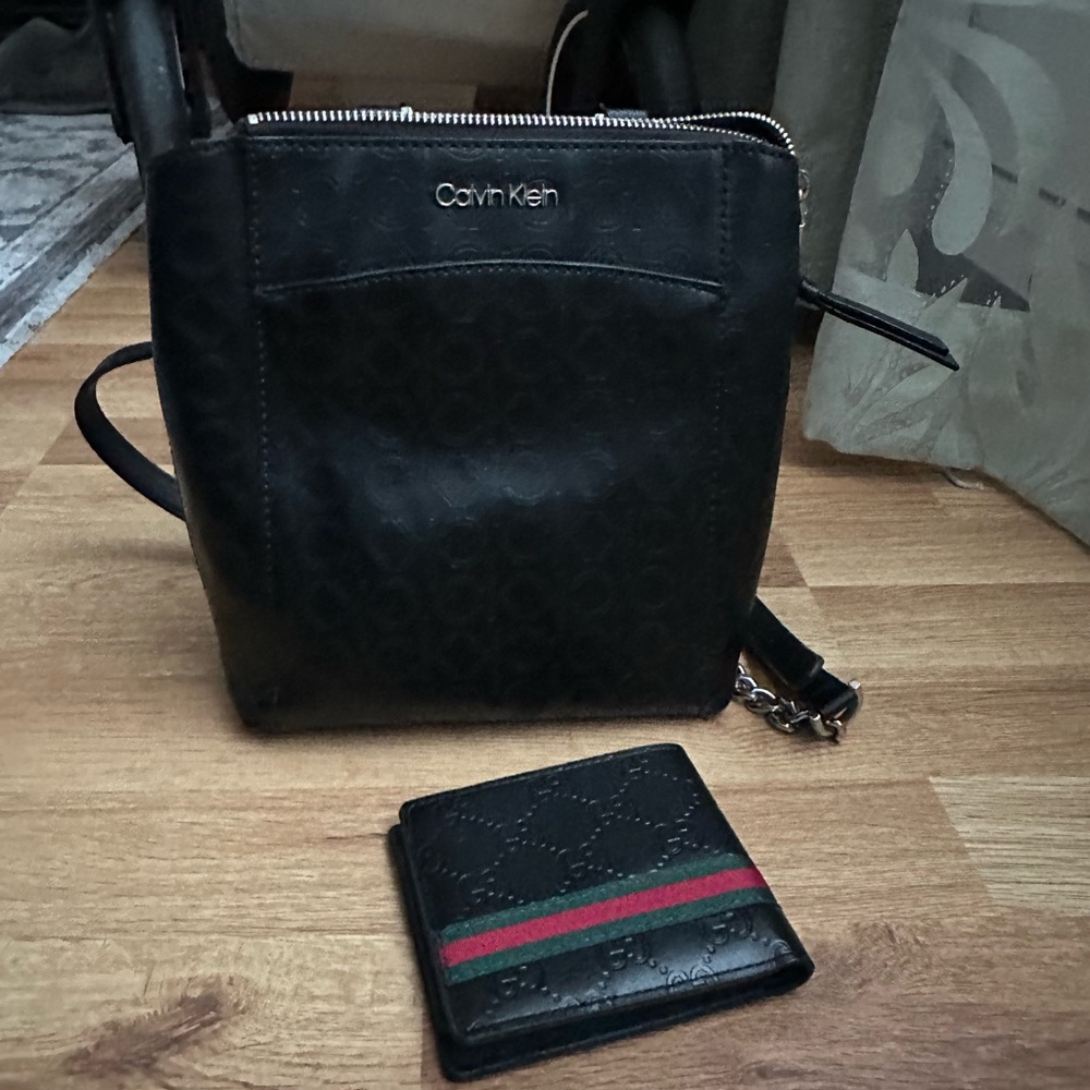 Calvin Klein Black Backpack. Wallet is for size.
